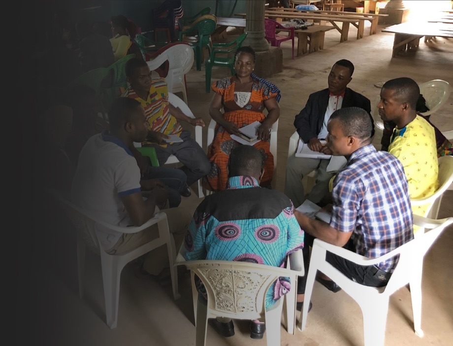 Leaders in training around a table